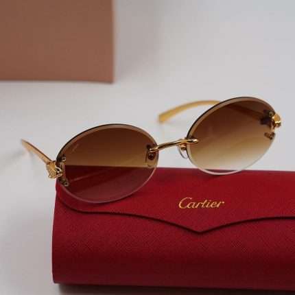 Cartier Sunglasses Rimless Oval Cut Gold - Yellow Ombre Tint